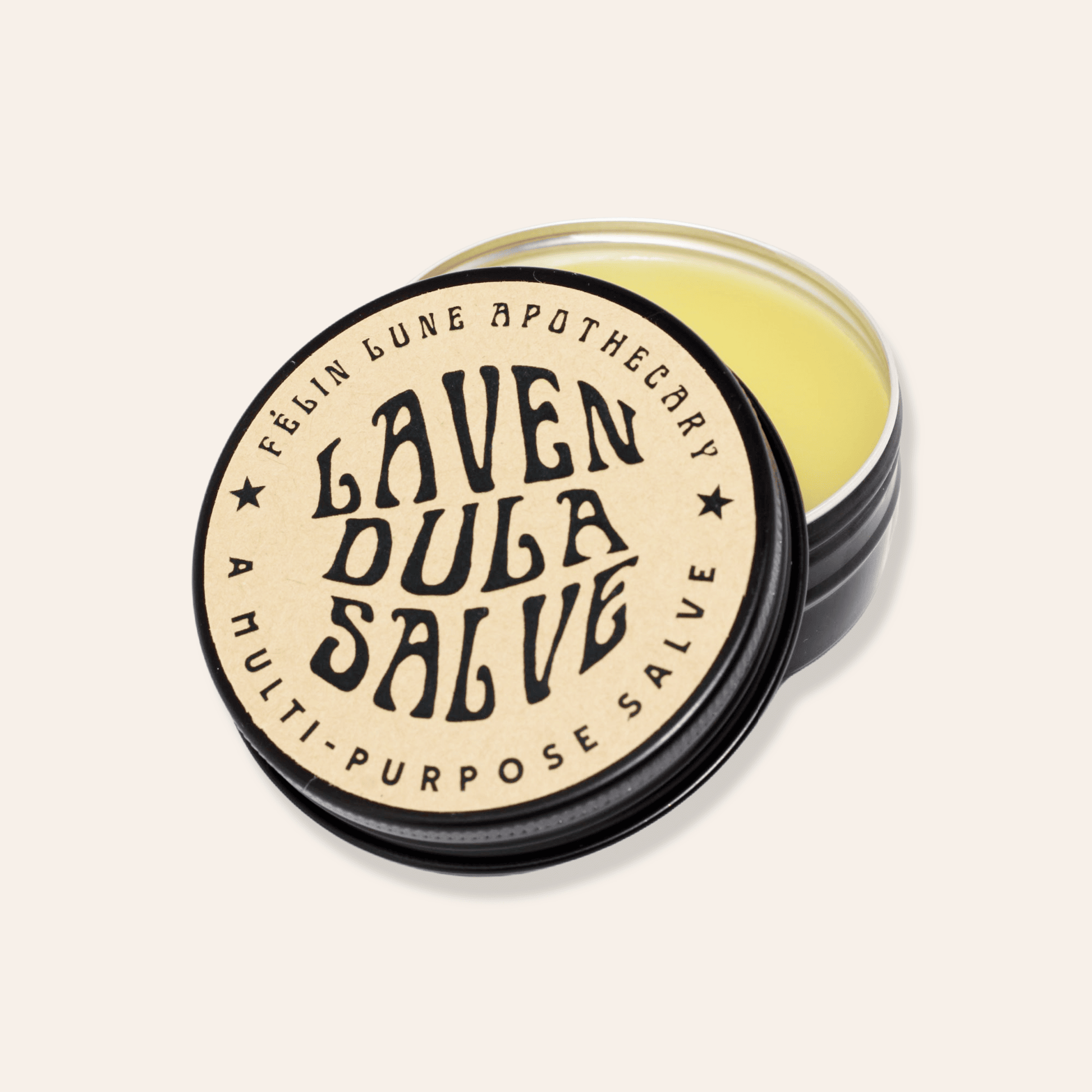 A black tin with  a yellow salve. The label that reads 'Lavendula Salve, A Multi-Purpose Salve'. 