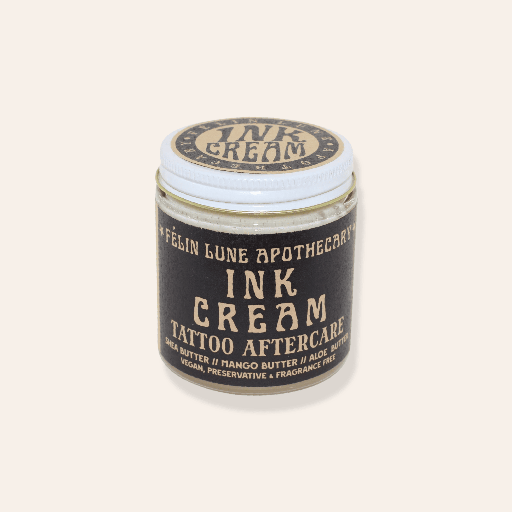 A jar of Ink Cream, a natural tattoo aftercare cream.